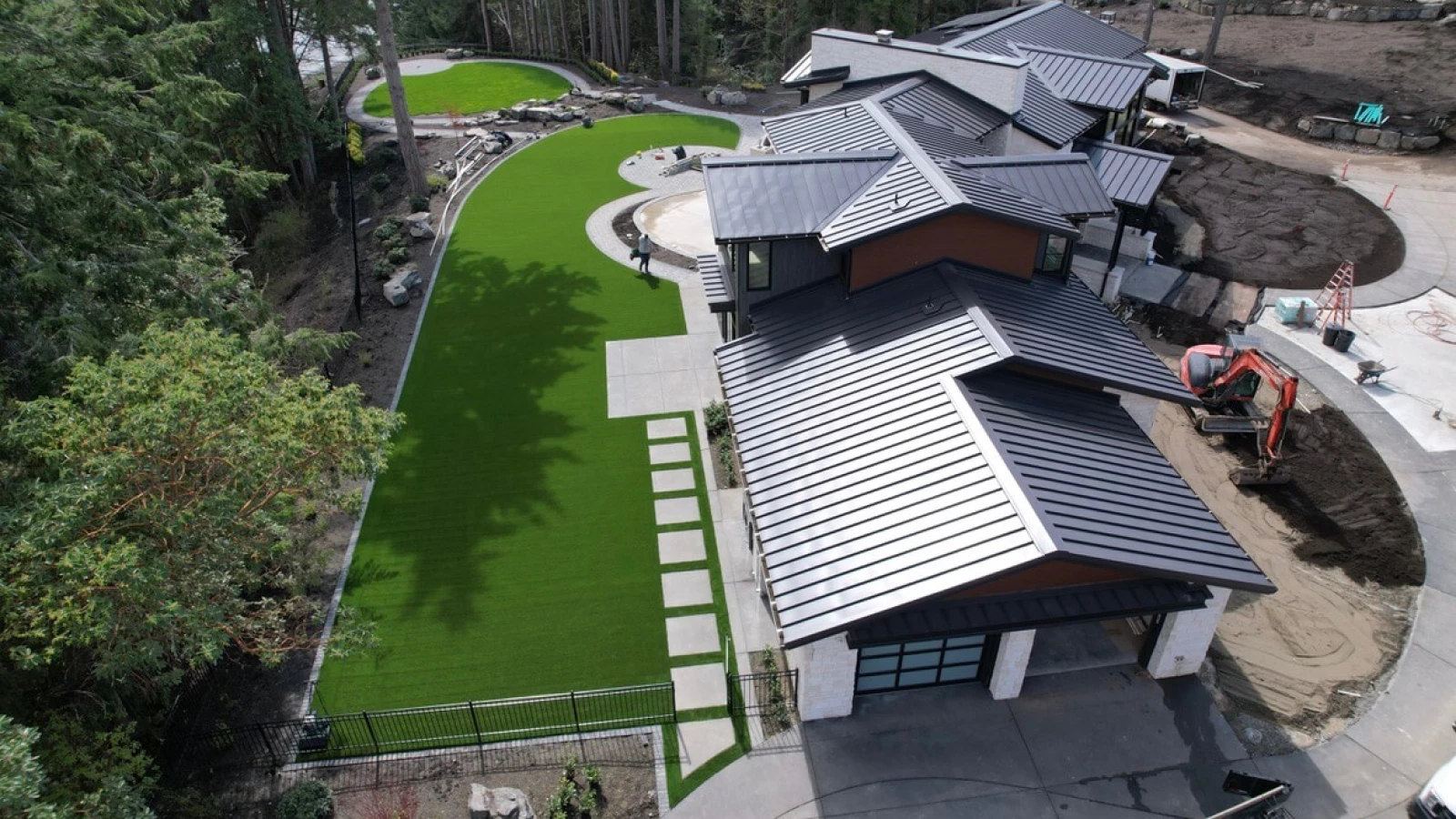 Synthetic turf installation at golden hour in Pierce County