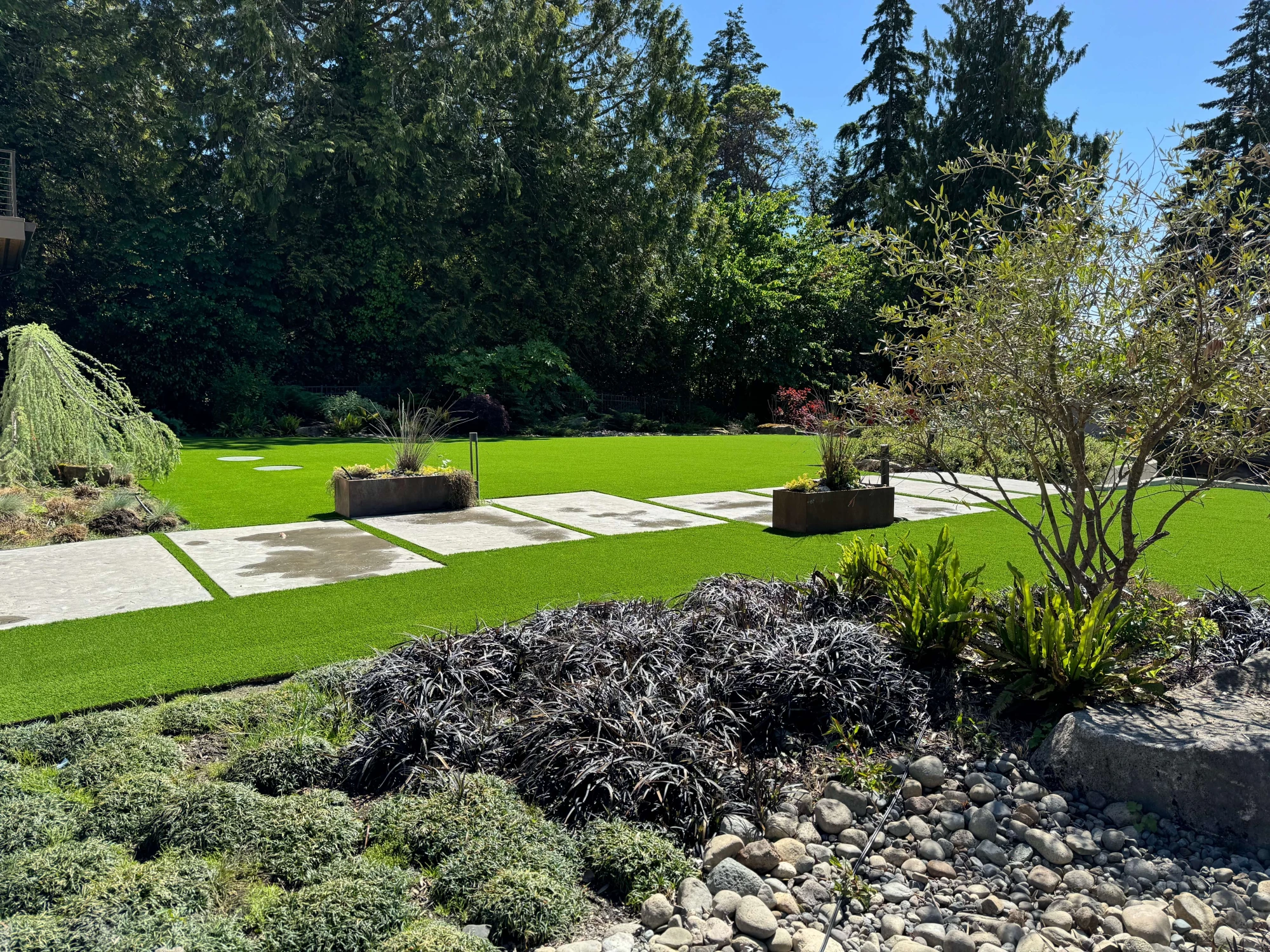 Synthetic turf backyard installation in Gig Harbor designed for family use